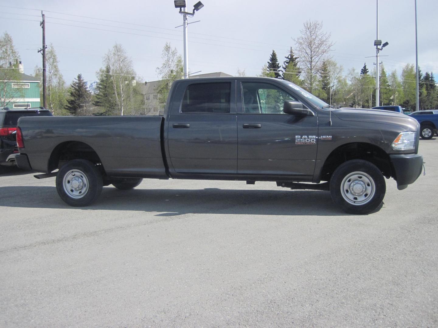 2016 gray /gray RAM 2500 Tradesman Crew Cab 4WD (3C6TR5HT6GG) with an 5.7L V8 OHV 16V engine, automatic transmission, located at 9530 Old Seward Highway, Anchorage, AK, 99515, (907) 349-3343, 61.134140, -149.865570 - Low miles on this ram 2500 come take test drive - Photo#2